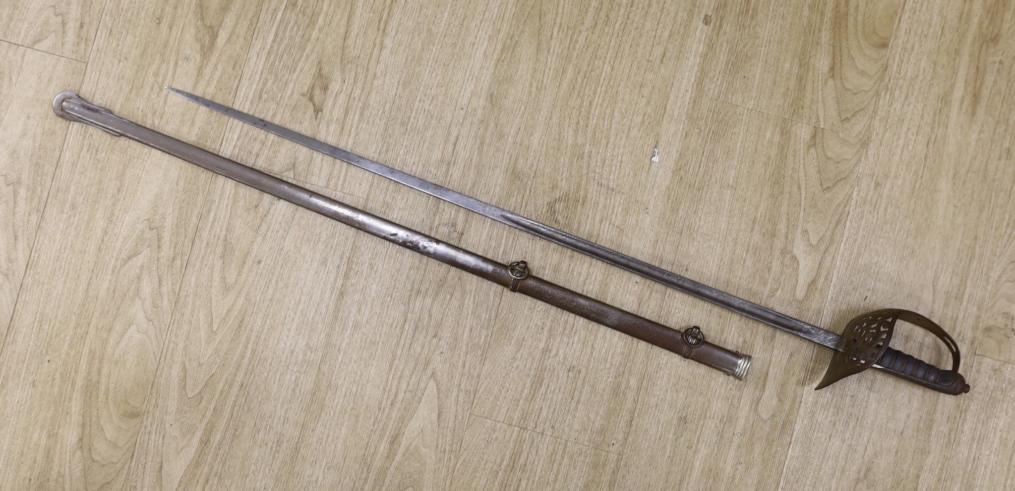 A George V officers sword with scabbard and a bayonet, sword100cm long